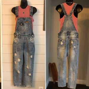 Distressed skinny jean Overalls